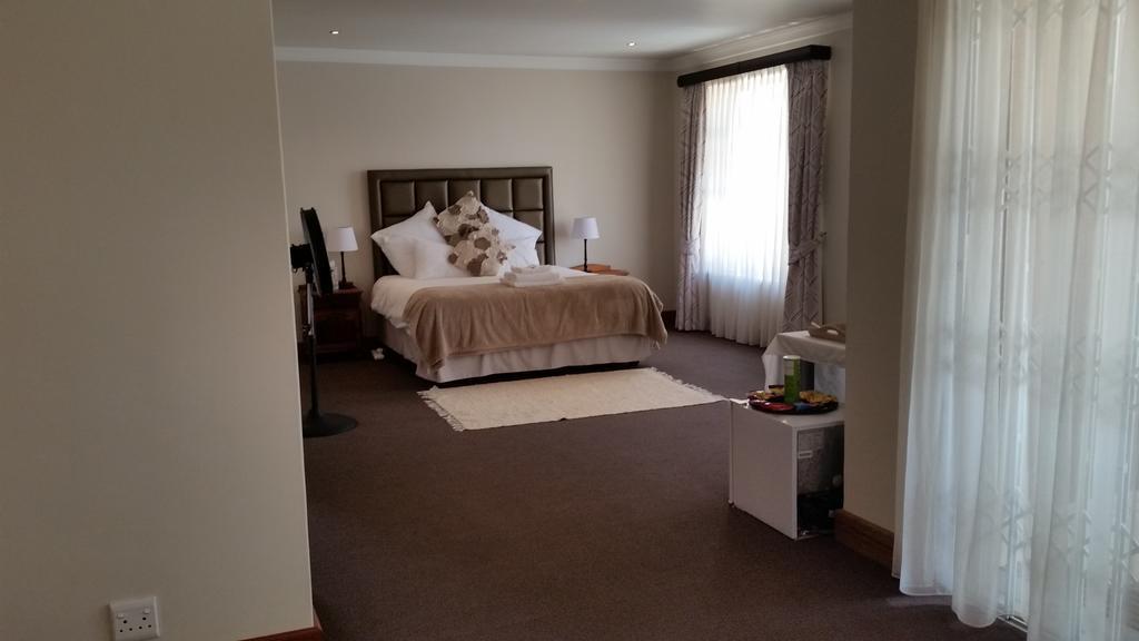 Bed and Breakfast 6 On Acacia Johannesburgo Habitación foto